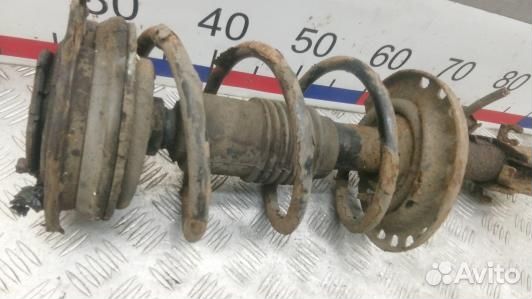 Стойка передняя правая nissan note E11 (GEA12N501)