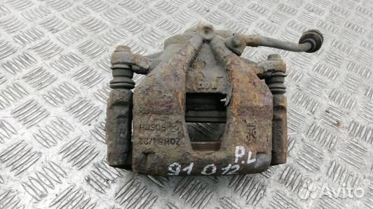 Суппорт тормозной передний левый opel corsa D (91O