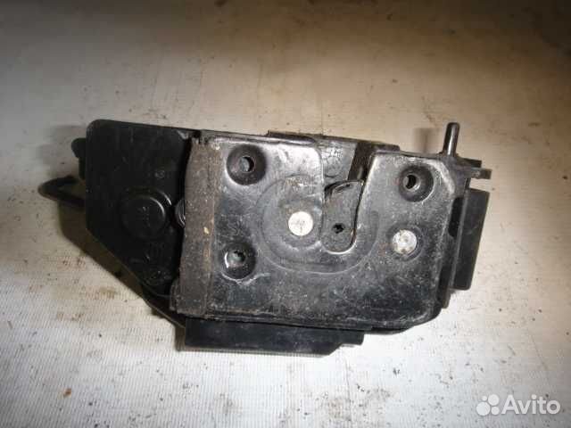 Замок двери Getz (03-10) зад L с активатором б\у (арт. 814101C000)