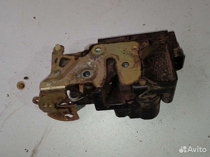 Замок двери передний левый Chevrolet lacetti