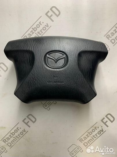 Подушка безопасности водителя Mazda 323 BJ 1999