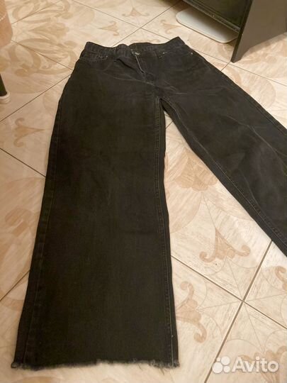 Джинсы-трубы с бахромой