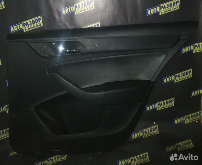 Обшивка двери Skoda Rapid