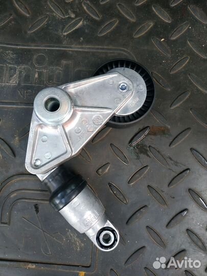 Натяжитель приводн. ремня ссанг енг кайрон,рекстон