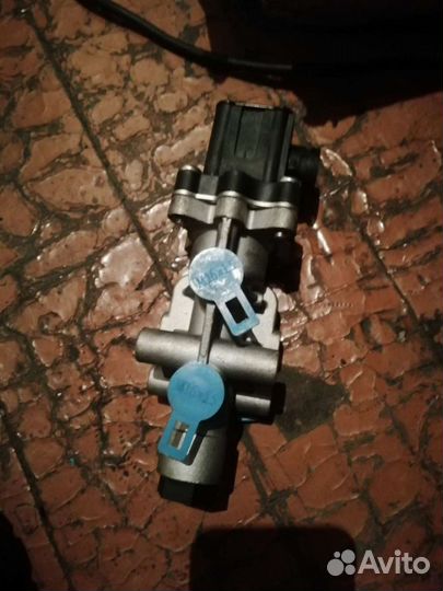 Клапан упр.подъемной оси