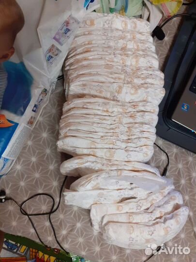 Подгузники Aura