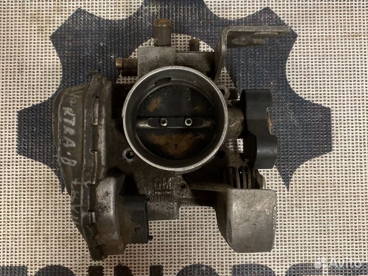Дроссельная заслонка Opel 90536084