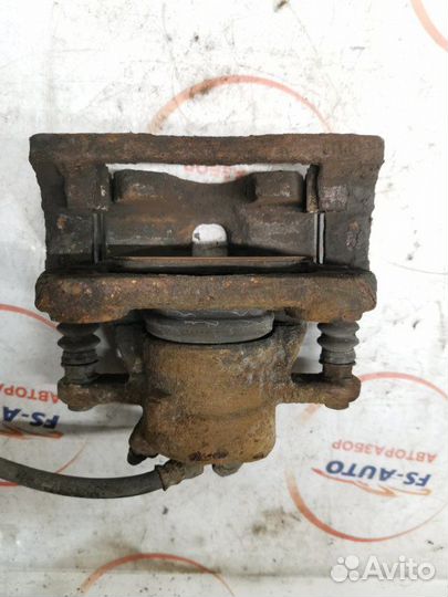 Суппорт тормозной передний правый Nissan Note 1.4