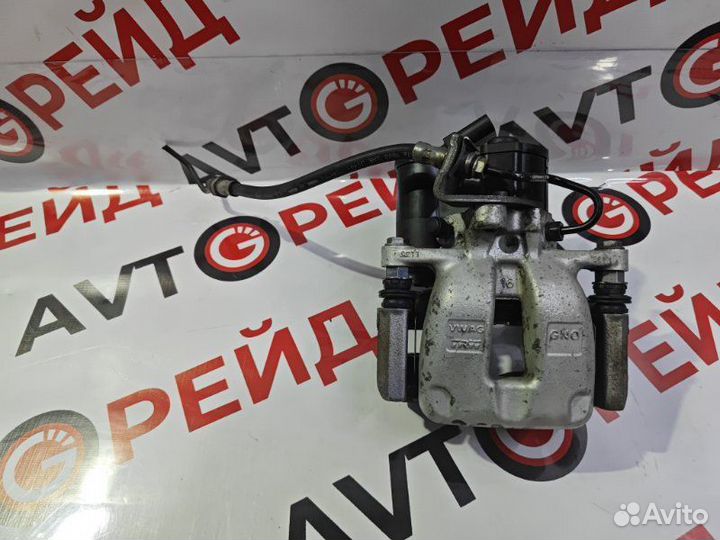 Суппорт тормозной задний правый Volkswagen Passat