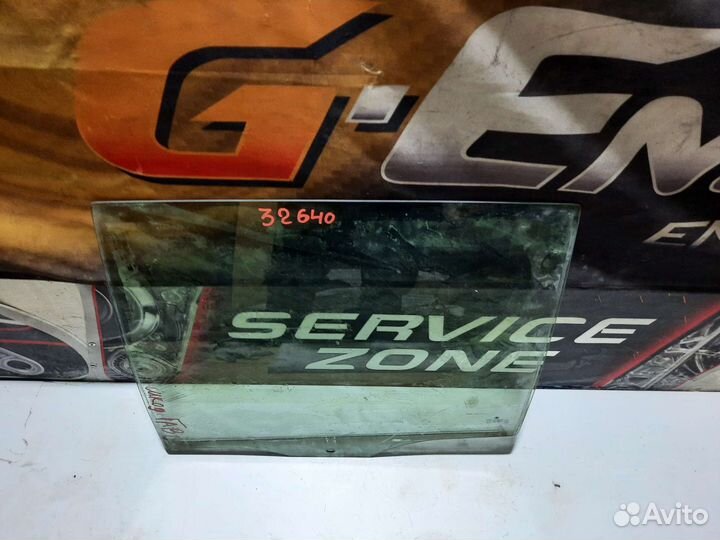 Стекло задней левой двери Skoda Fabia унив