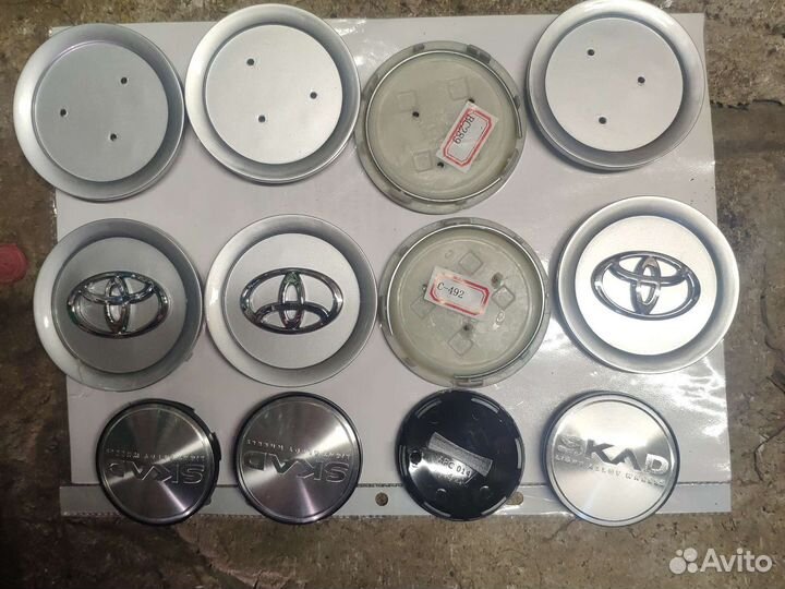 Эмблемы, колпачки для колес