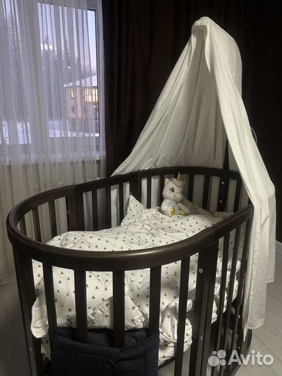 Детская кроватка с маятником круглая