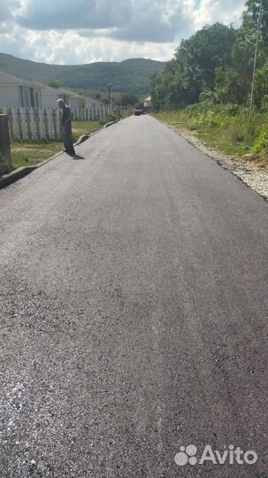 Укладка асфальта. асфальтная крошка