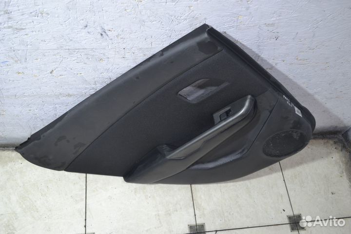 Обшивка двери задняя левая Kia Rio 3