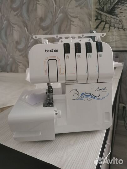 Новый современный оверлок Brother 4100D