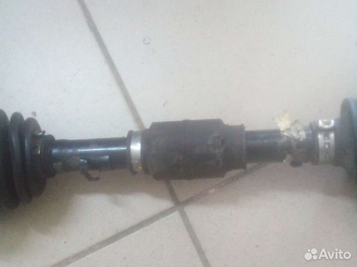 Привод (полуось) левый передний Toyota Corolla E12