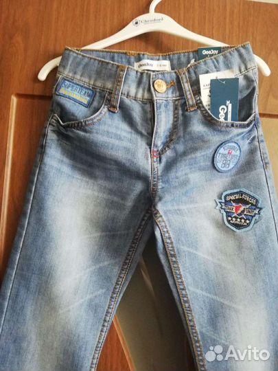 Джинсы новые