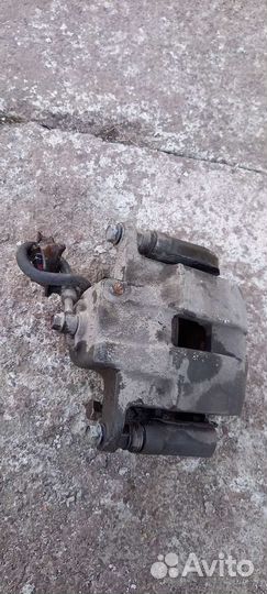 Суппорт передний левый Kia Soul, 58180-K0A50