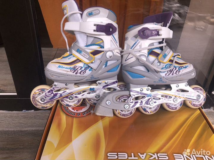 Роликовые коньки