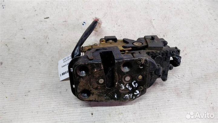 Замок двери задней левой Mazda 626 GE 92-97г