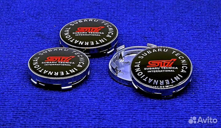 Комплект колпачков с логотипом Subaru STI