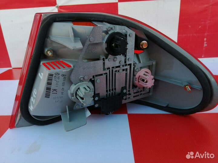 Фонарь задний левый оригинал Мерседес W210