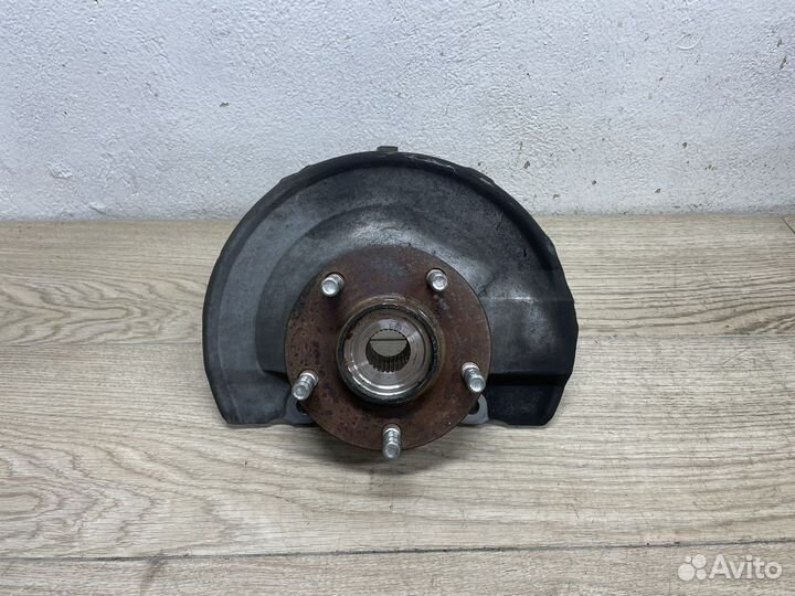 Кулак левый передний Mitsubishi Lancer 10