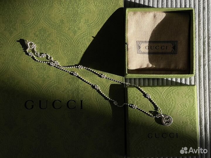 Серебряная подвеска Gucci