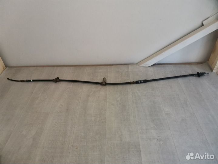 Трос стояночного тормоза левый Hyundai Accent 1.5