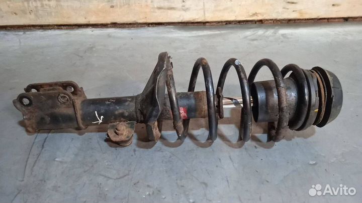 Стойка амортизатора передняя левая Chevrolet