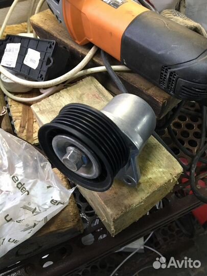 Ролик с натяжителем ford