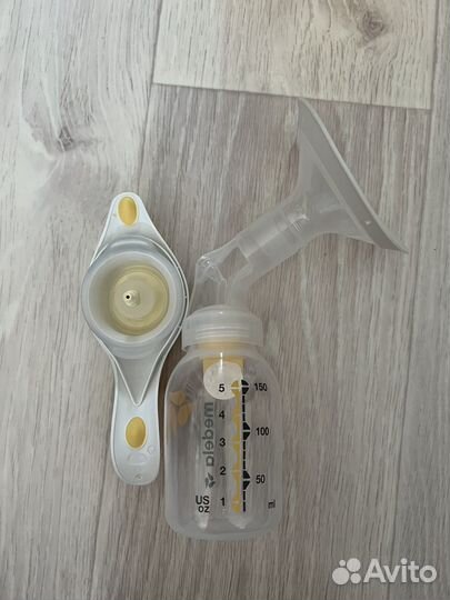 Молокоотсос medela ручной