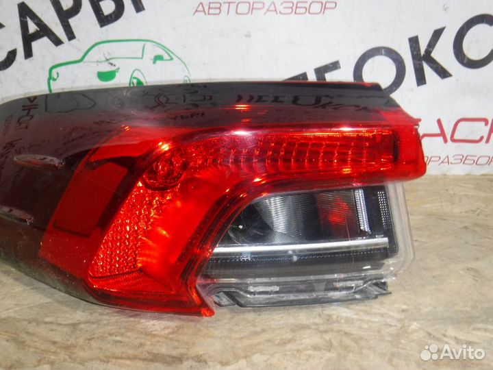 Фонарь левый наружный Toyota Corolla E210 (2018+)