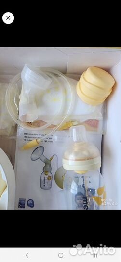 Молокоотсос Medela электрический