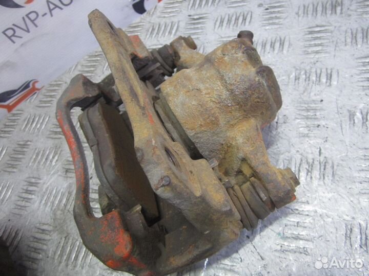 Суппорт тормозной передний Geely Emgrand EC7 09-17