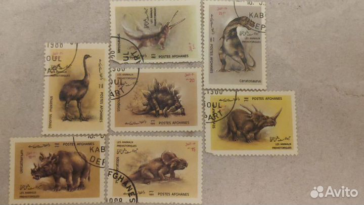 Марки серия Динозавры 7шт