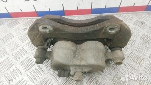 Суппорт тормозной передний правый mitsubishi outla