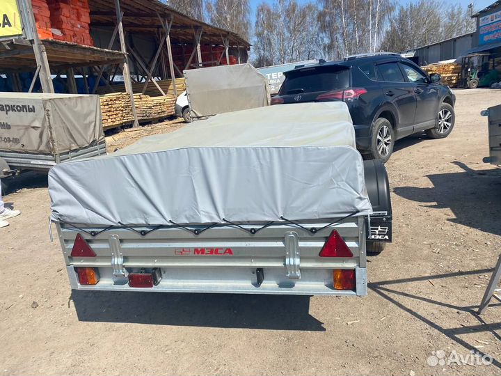 Прицеп 817703.022 грузовой с тентом 50 см мзса