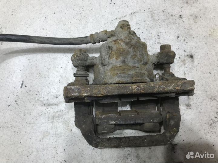 44001JG00A Суппорт задний R Nissan X-Trail T31