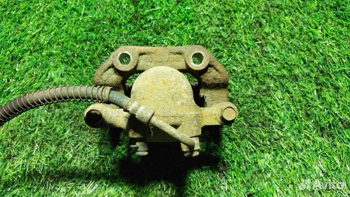 Суппорт задний левый SsangYong Kyron