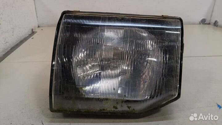 Фара (передняя) левая Mitsubishi Pajero