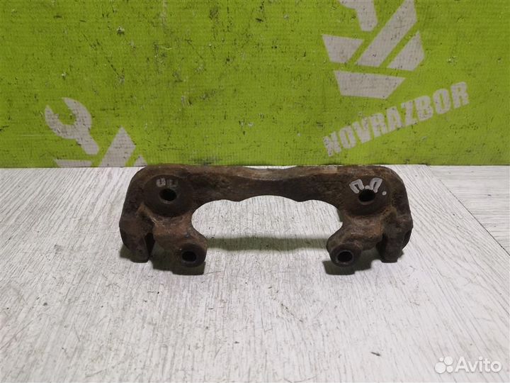 Скоба суппорта переднего Киа Сепия Шума 96-01