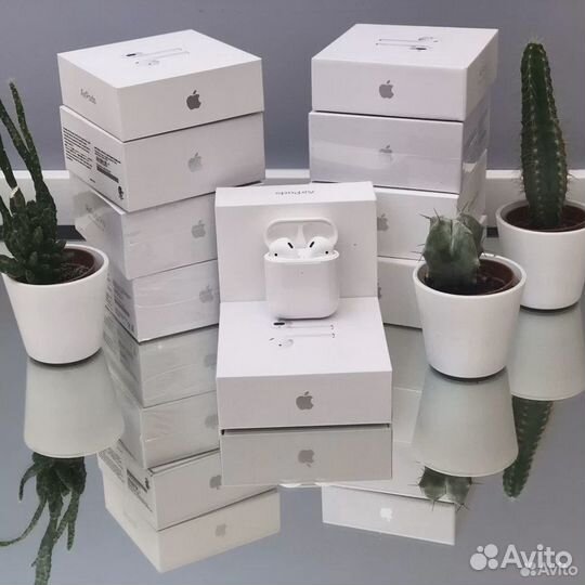 Беспроводные наушники Apple