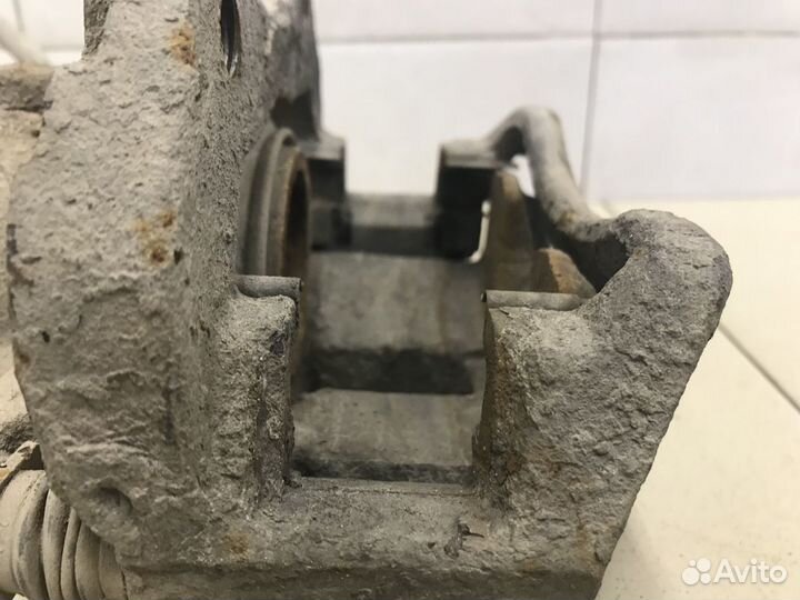 Суппорт передний правый Primera P12E 2002-2007