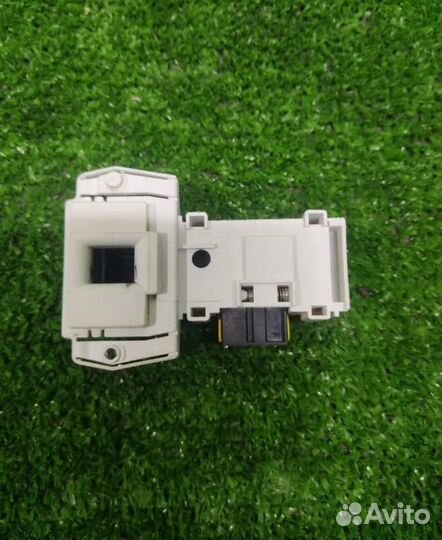 Устройство блокировки люка Candy