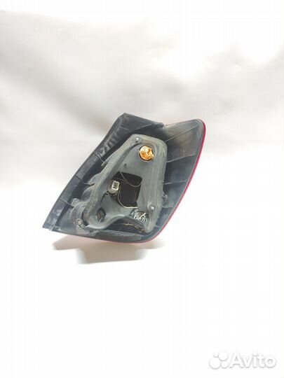 Фонарь задний левый Toyota Corolla Verso E120 2001