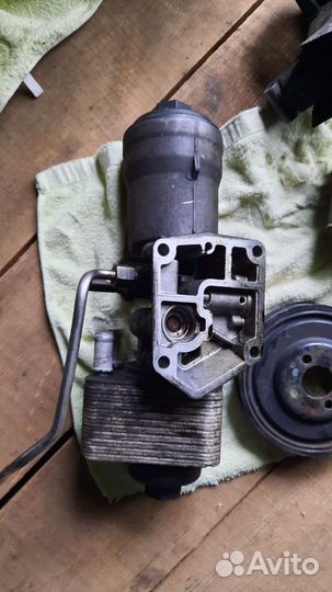 Корпус масляного фильтра 2.0 TDI BMM