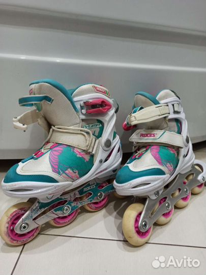 Роликовые коньки