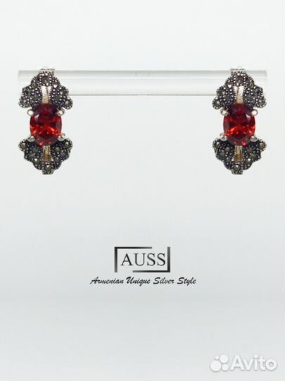 Серебряное кольцо с гранатом