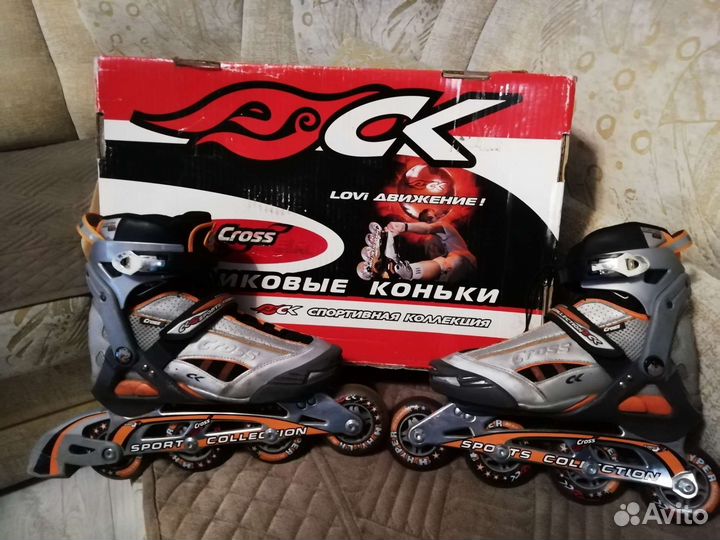 Роликовые коньки